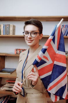 Woman Wearing Eyeglasses while Holding a Flag